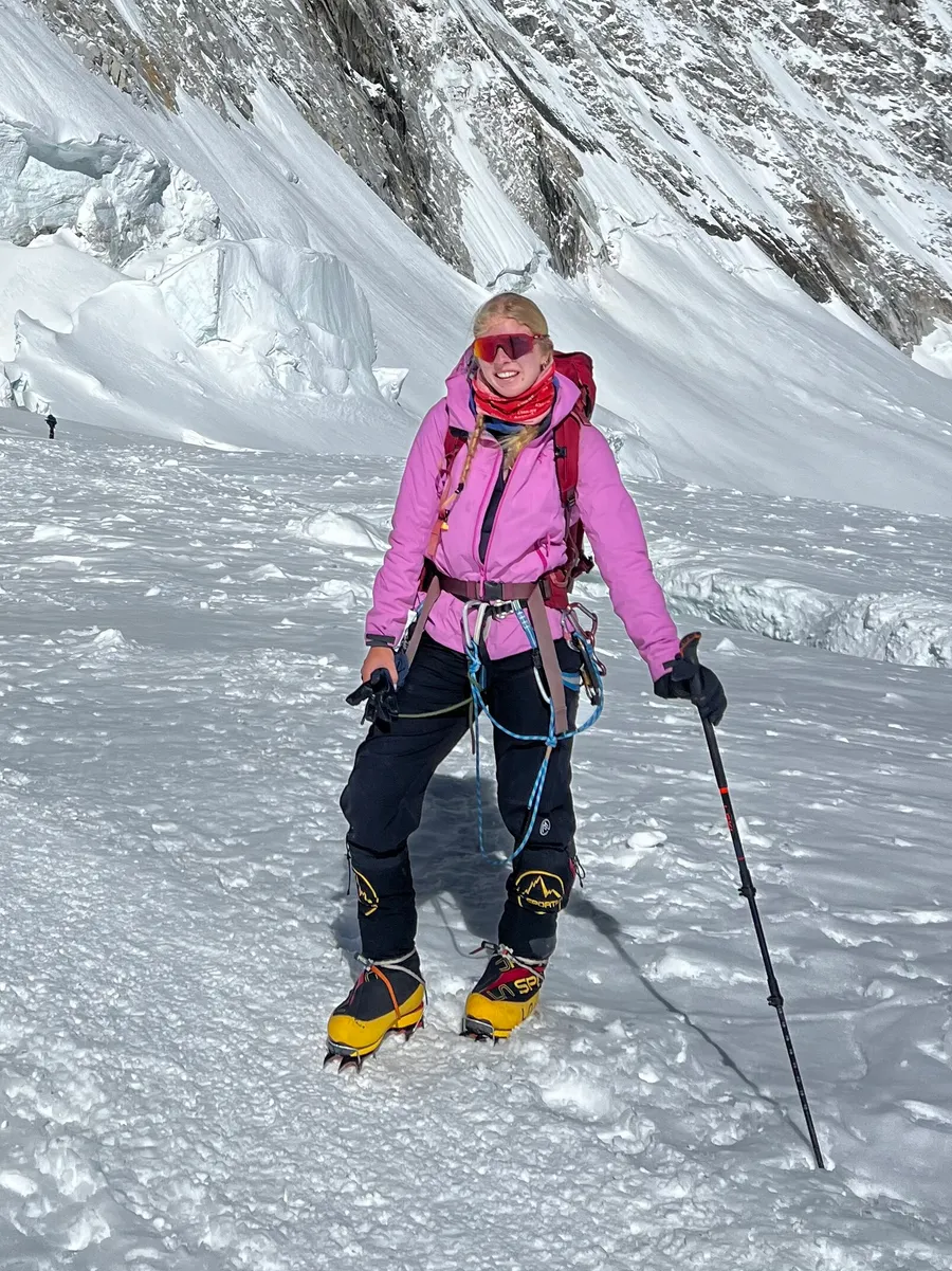 Bianca in a pink jacket on the glacier below the Lhotse Face