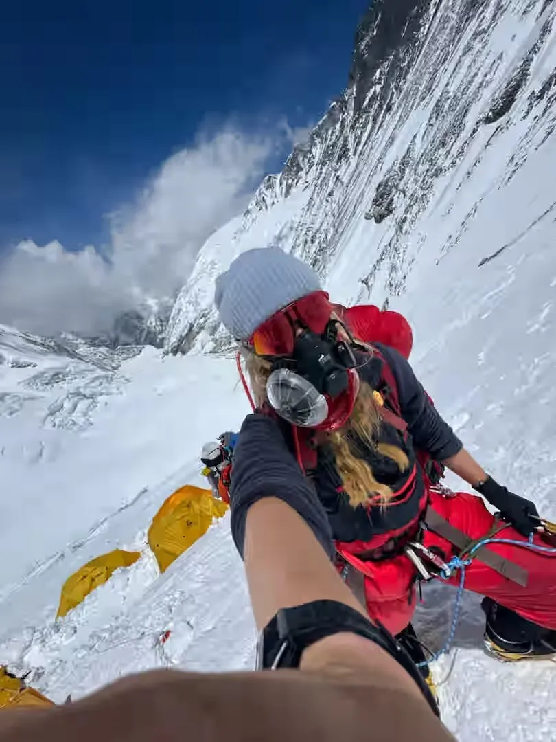 Bianca climbing the Lhotse Face above the yellow tents of camp 3